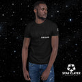 StarPlayer Space Tee worn by a man, featuring a black design against a starry background, showing comfort and style.