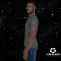 Model wearing the StarPlayer Space Tee in a cosmic background, showcasing its comfort and style.