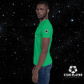 Man wearing the StarPlayer Space Tee in green, showcasing the soft cotton fabric and stylish design against a starry background.