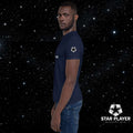 Model wearing the StarPlayer Space Tee in navy against a starry background, showcasing comfort and durability.