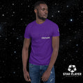 Model wearing StarPlayer Space Tee in purple against a starry backdrop, showcasing durability and comfort of the cloth.