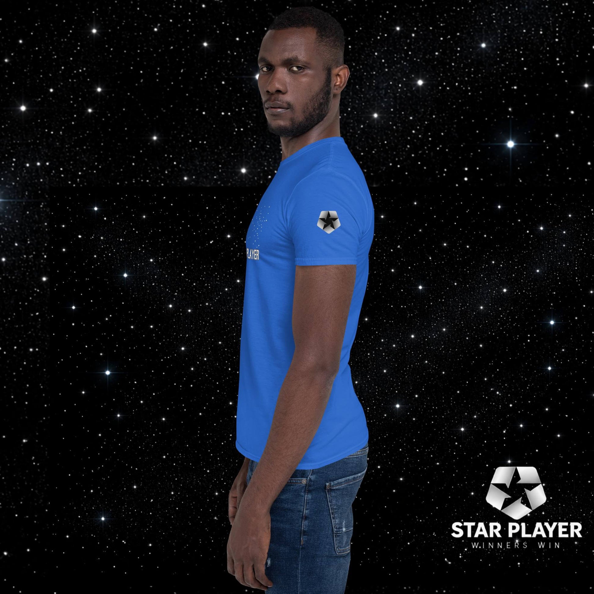 StarPlayer Space Tee modeled by a man against a starry background, showcasing the vibrant blue color and comfortable fit.